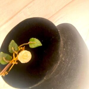 Women’s fancy gold tone brooch with white resin rose and green.
